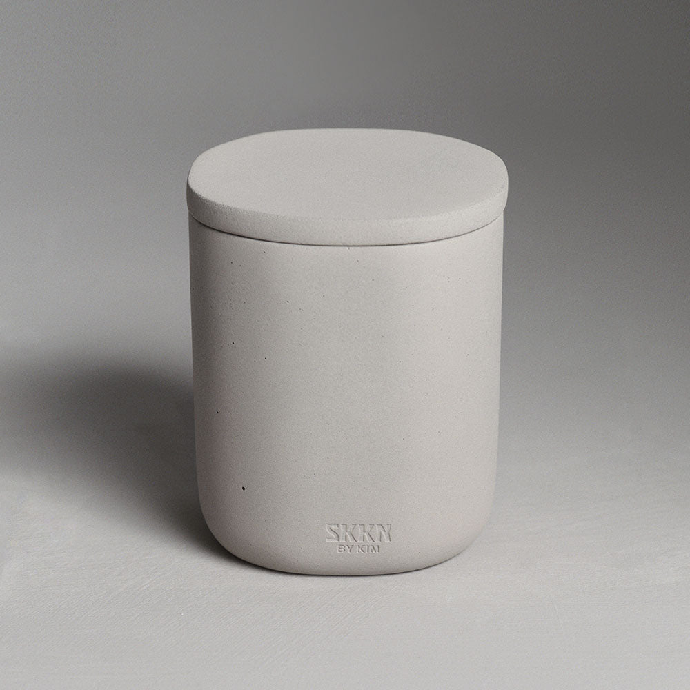 Front view of SKKN BY KIM canister.