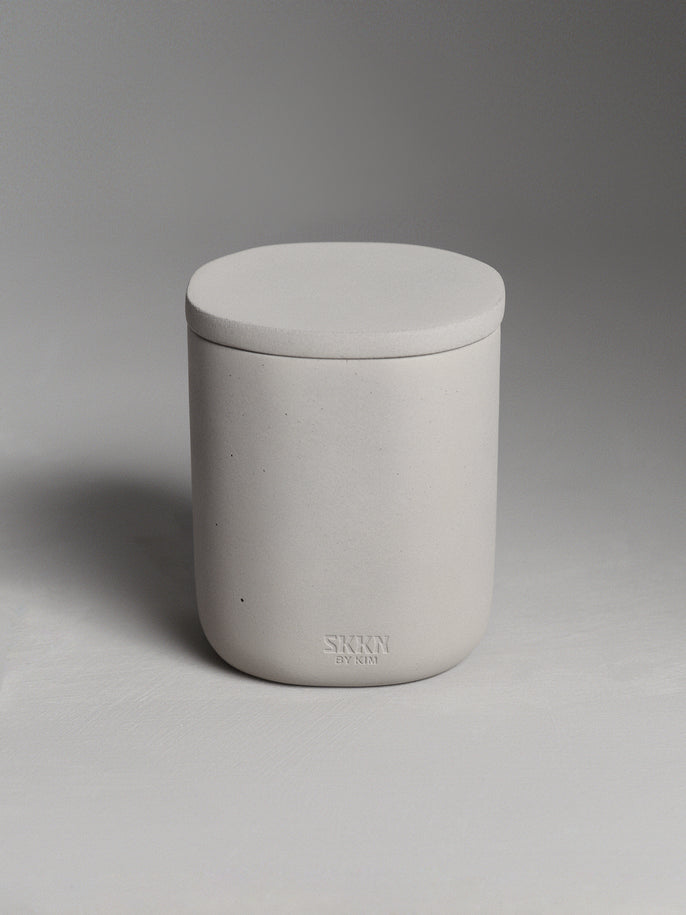 Front view of SKKN BY KIM canister.